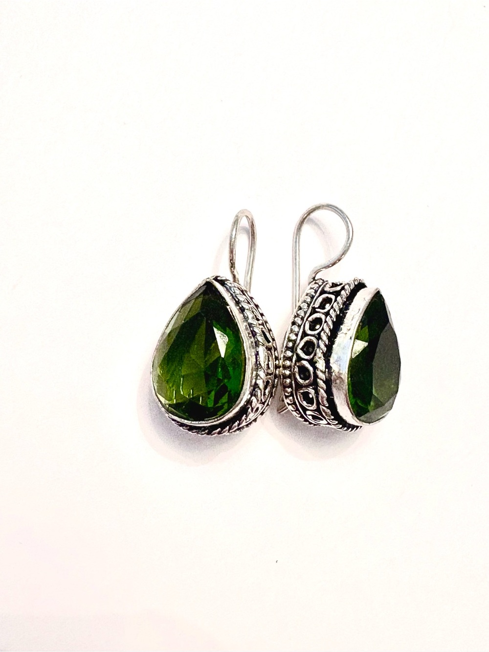 Beautiful, 1 1/4 inch, gorgeous design, Peridot earrings with closure back.